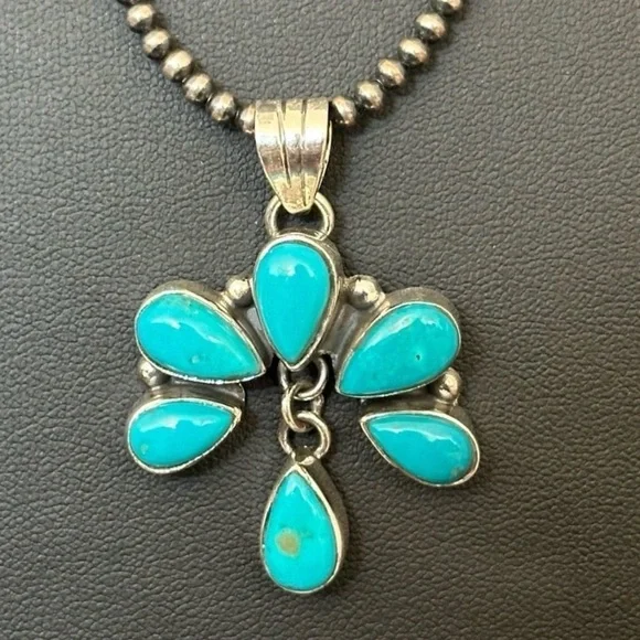 Kingman turquoise dangle Naja southwestern sterling silver pendant